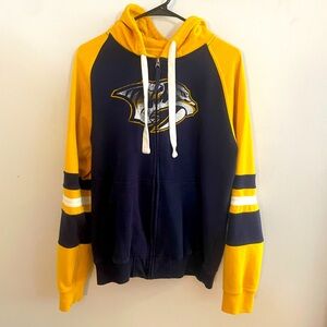 Nashville Predators sweatshirt.